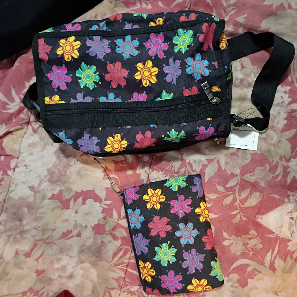 Gal Meets Glam Black Crossbody Bag with Colorful Floral Design